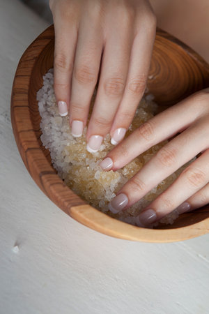 Woman touching bowl of sugarの写真素材