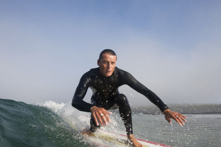 Man surfing a wave.の写真素材