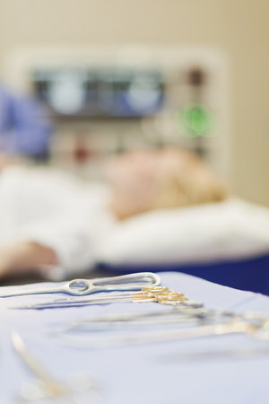 Close up of surgical tools on matの写真素材