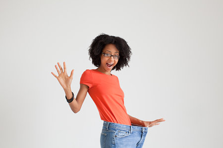 Woman with loose jeans