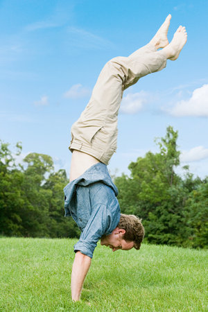 Man doing a handstandの写真素材