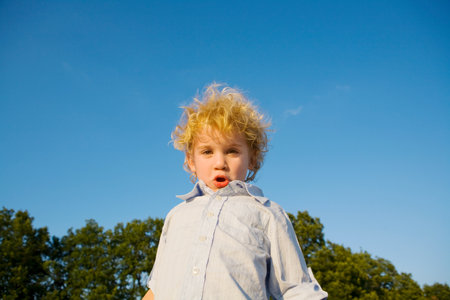 Portrait of a boy making facesの写真素材