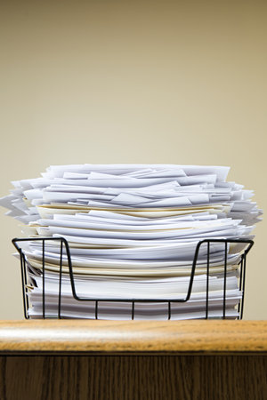Overflowing paper inboxの写真素材