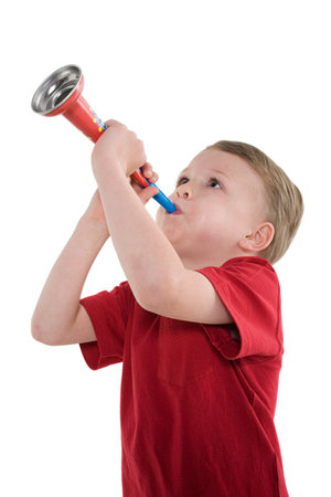 A boy playing a trumpet