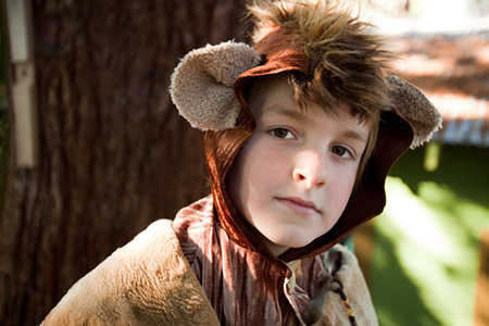 Boy dressed up as bearの写真素材