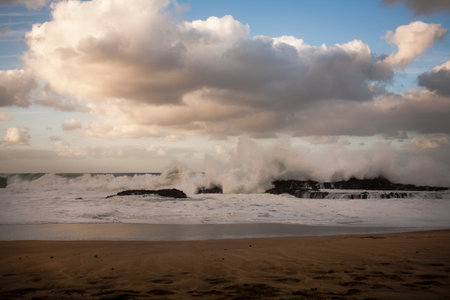 Waves breaking on beach, Hawaii, USA