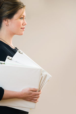 Woman with foldersの写真素材