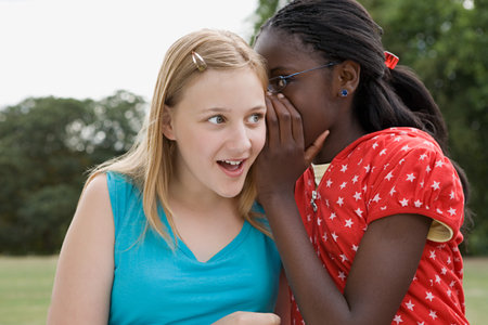 Girls whisperingの写真素材