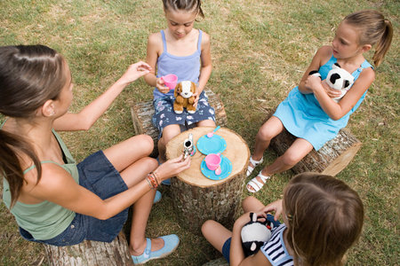 Girls having a tea partyの写真素材