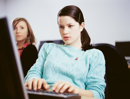 Girl using computerの写真素材