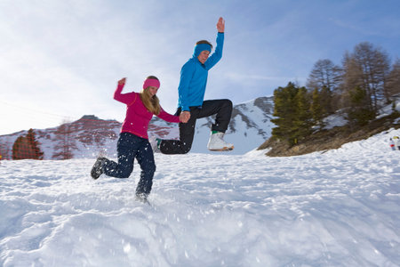 Couple at ski, jumpingの写真素材