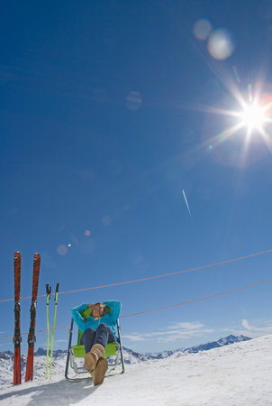 Girl sitting in sunshineの写真素材