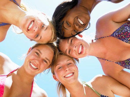 Women smiling, shot from low angleの写真素材