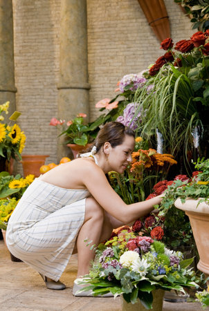 Woman shopping in a flower shopの写真素材