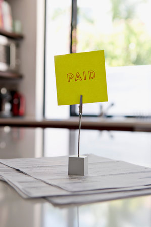 Bills on a paid pileの写真素材