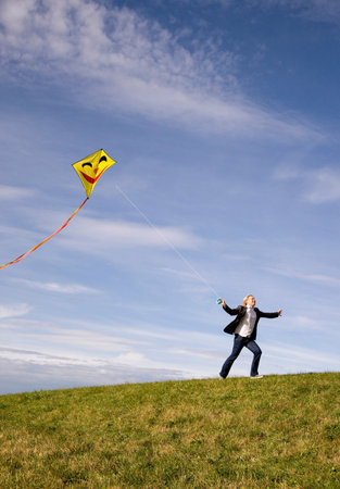 Man flying a kiteの写真素材