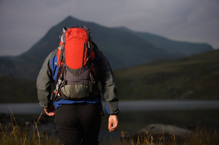 Hiker carrying a backpack.