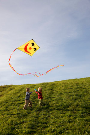 Two Boys fly a Kiteの写真素材