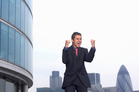 Business man celebrating