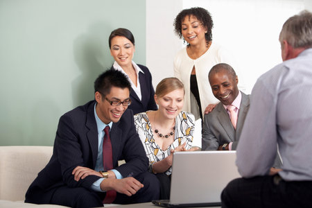 A business group around a laptopの写真素材