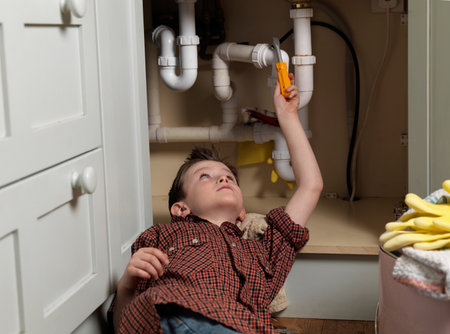 Boy dressed as repair manの写真素材