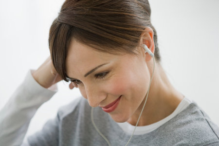Woman wearing earphones.の写真素材