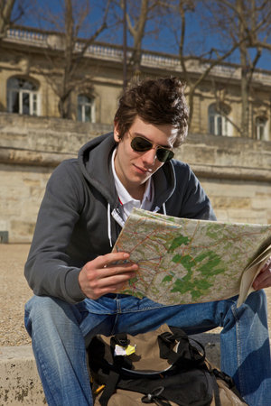 Man looking on the mapの写真素材