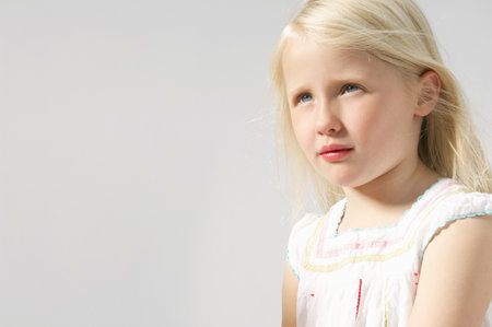 girl looking upの写真素材