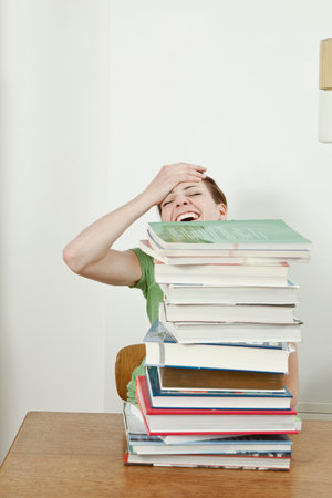Female student with stack of books