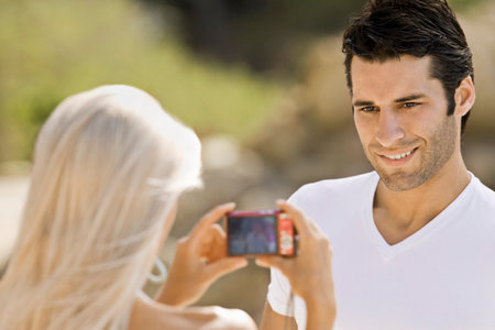 A latin male having his photo takenの写真素材