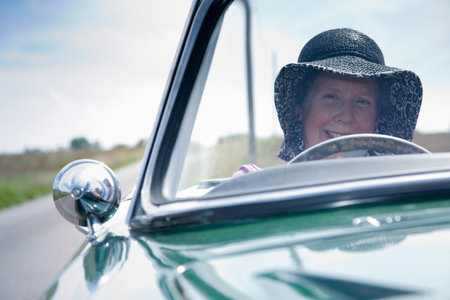 Mature lady driving car