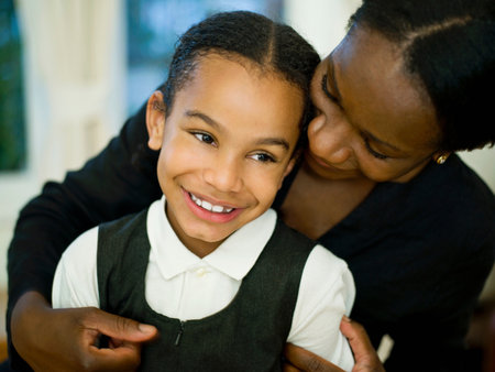 A mother hugging her little girlの写真素材