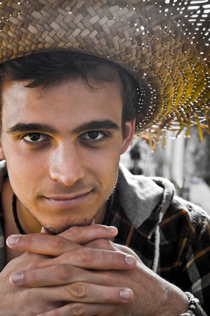 Young man Portrait under heavy sun
