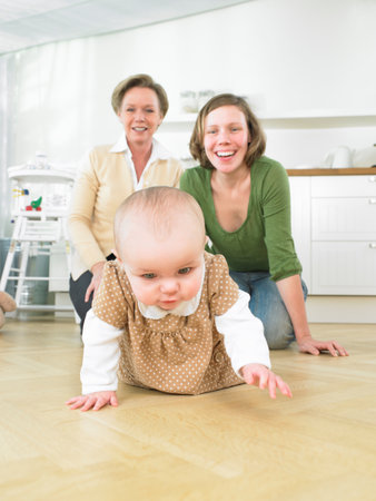 Grandmother and mother with babyの写真素材