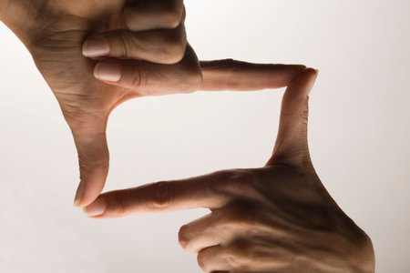 Hands forming frame