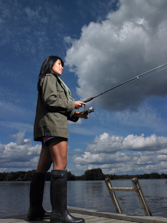 Woman fishingの写真素材