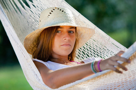 Girl in a hammockの写真素材