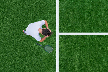 Man losing tennis matchの写真素材