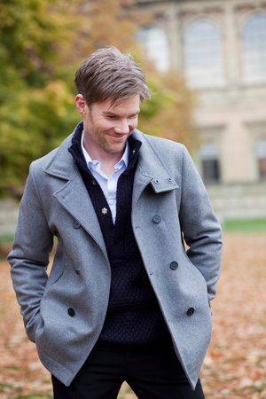 Man in autumn city atmosphereの写真素材