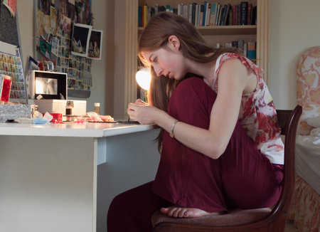 Girl making jewelryの写真素材
