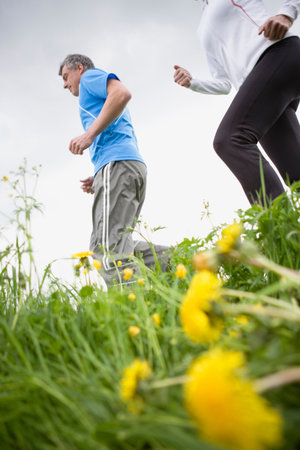 Couple runningの写真素材