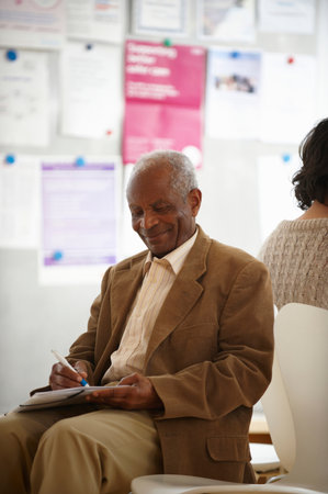 Elderly black man in waiting room