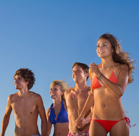 Group run in swim suitsの写真素材