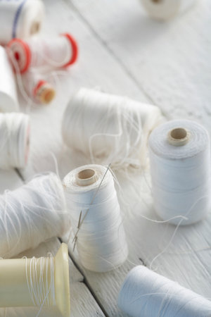 Collection of white cotton reels