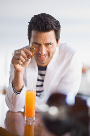 Man with key at bar