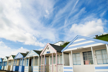 Beach huts under blue skyの写真素材