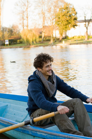 Man rowing row boat