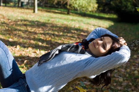 Girl relaxing in the sunshineの写真素材