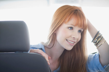 Woman sitting in a carの写真素材