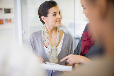 Business people talking in officeの写真素材